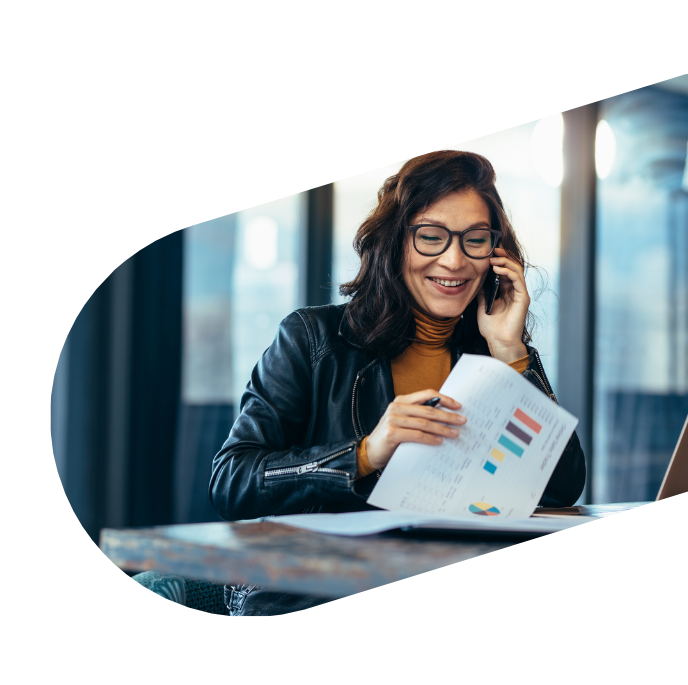 woman with a phone and papers